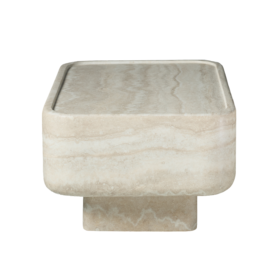Low, clean-lined, and quietly sculptural, this rectangular coffee table brings the look of natural travertine to contemporary living spaces.