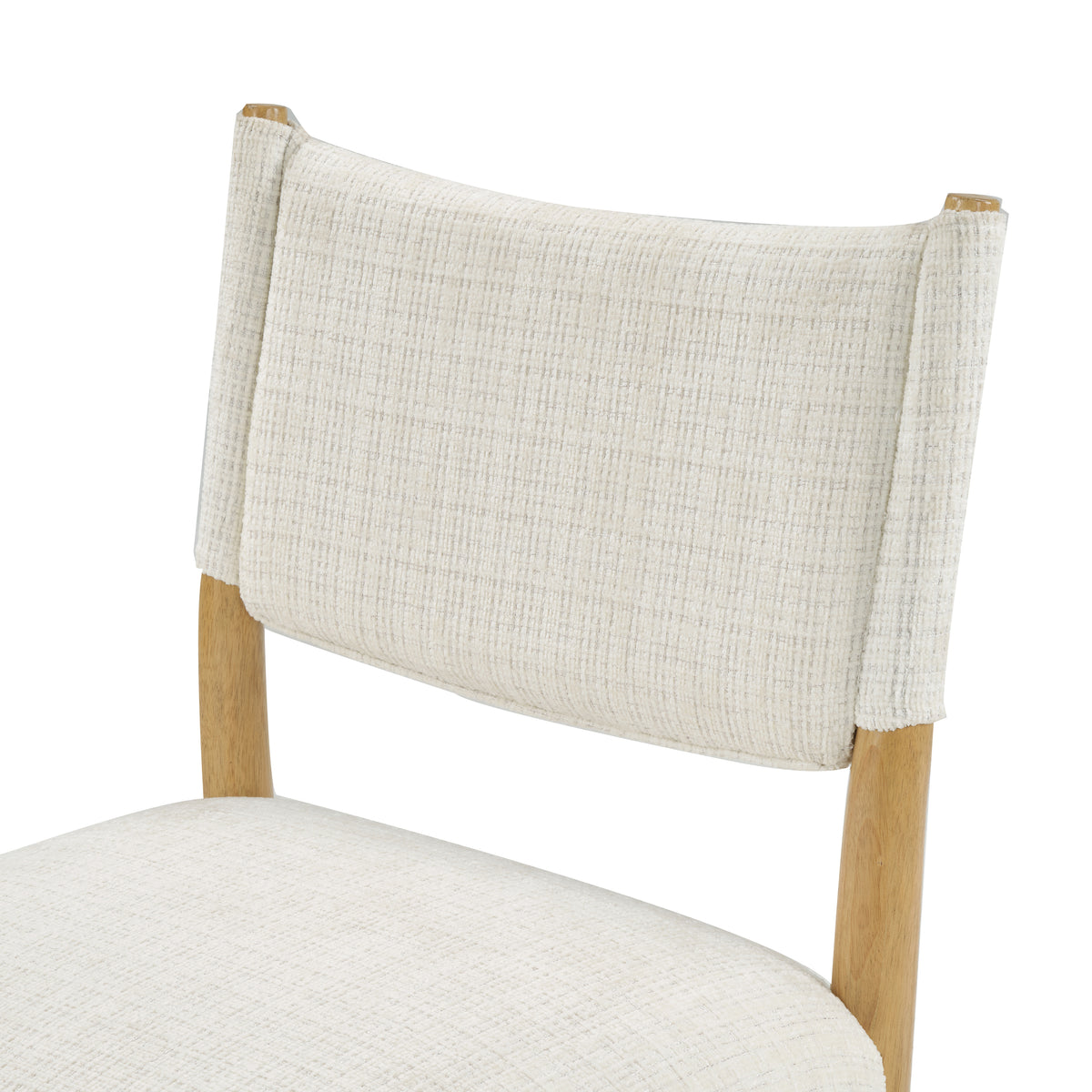 Cream Upholstered Natural Wood Dining Chairs — curved backrest close-up