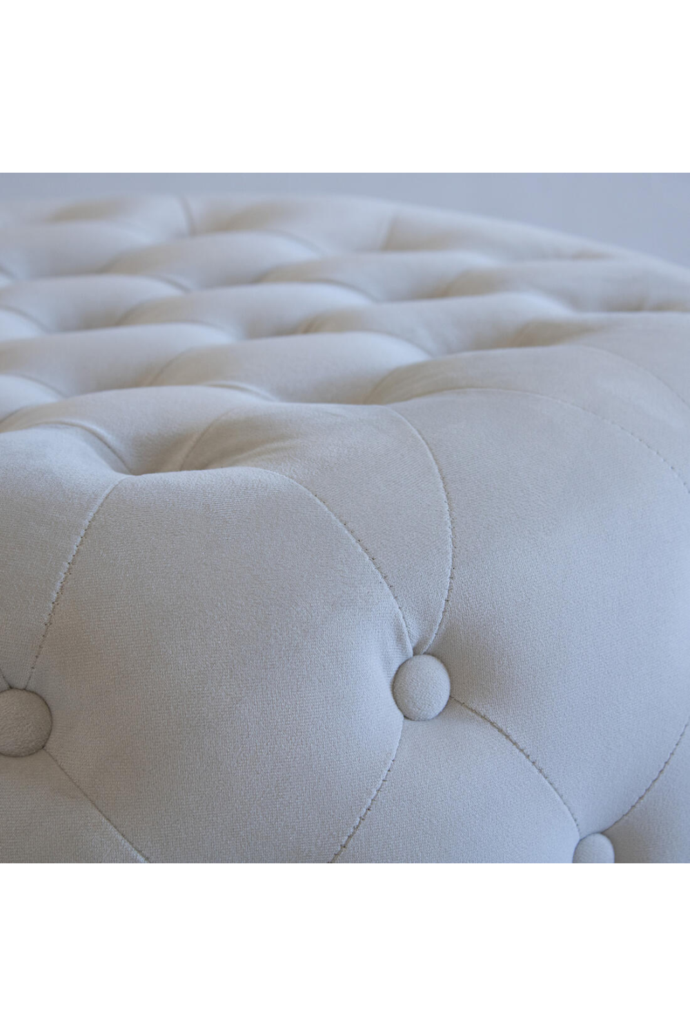 Buttoned Velvet Round Ottoman | Andrew Martin Forte | Oroa.com