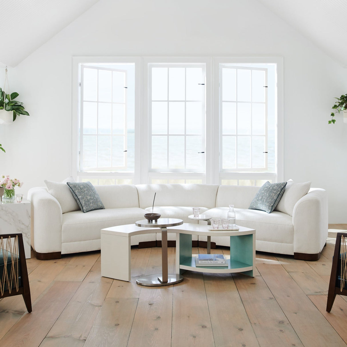 White S-Shaped Cocktail Table – Over Flow – angled view