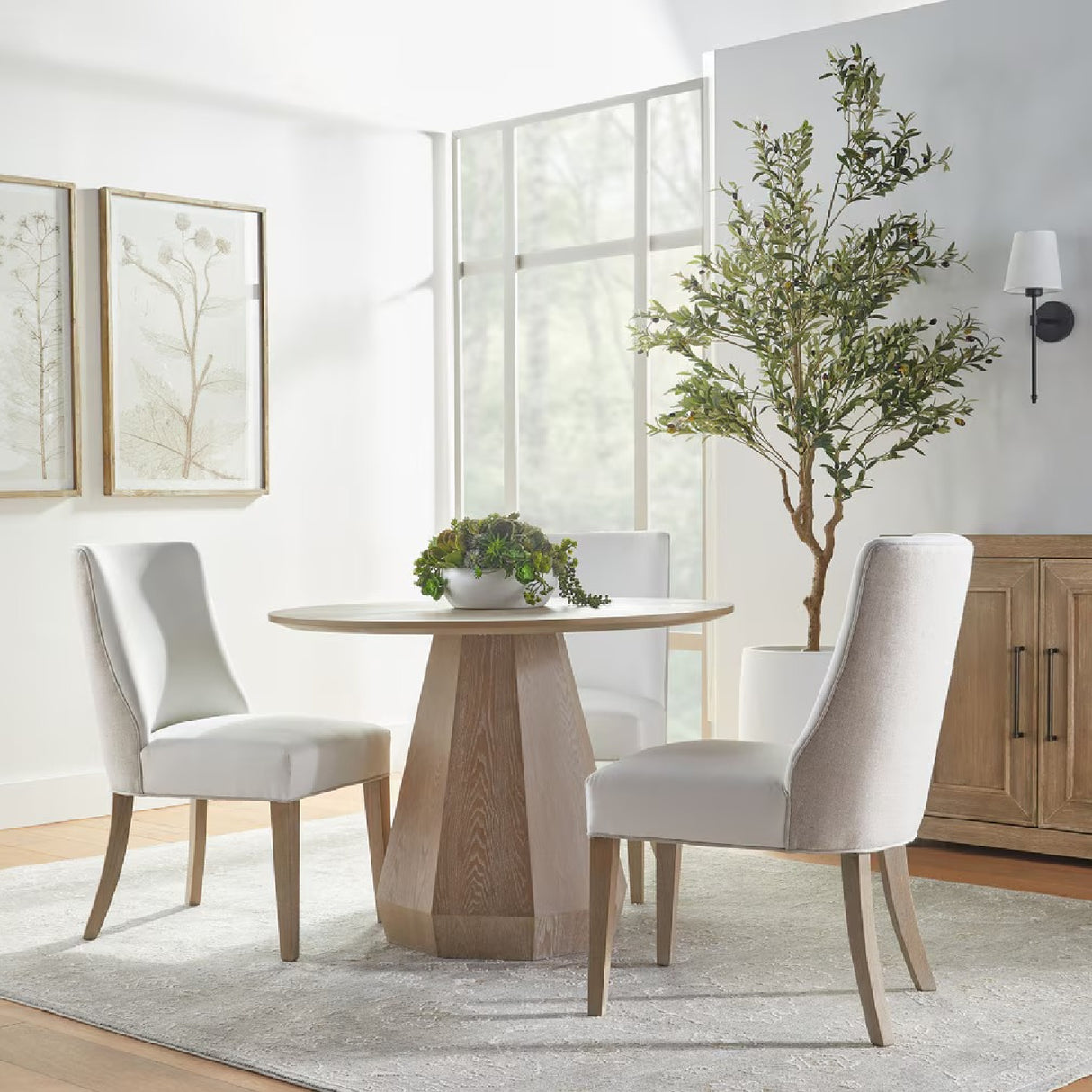 Round Wooden Dining Table | Living Essentials Coulter – angled view
