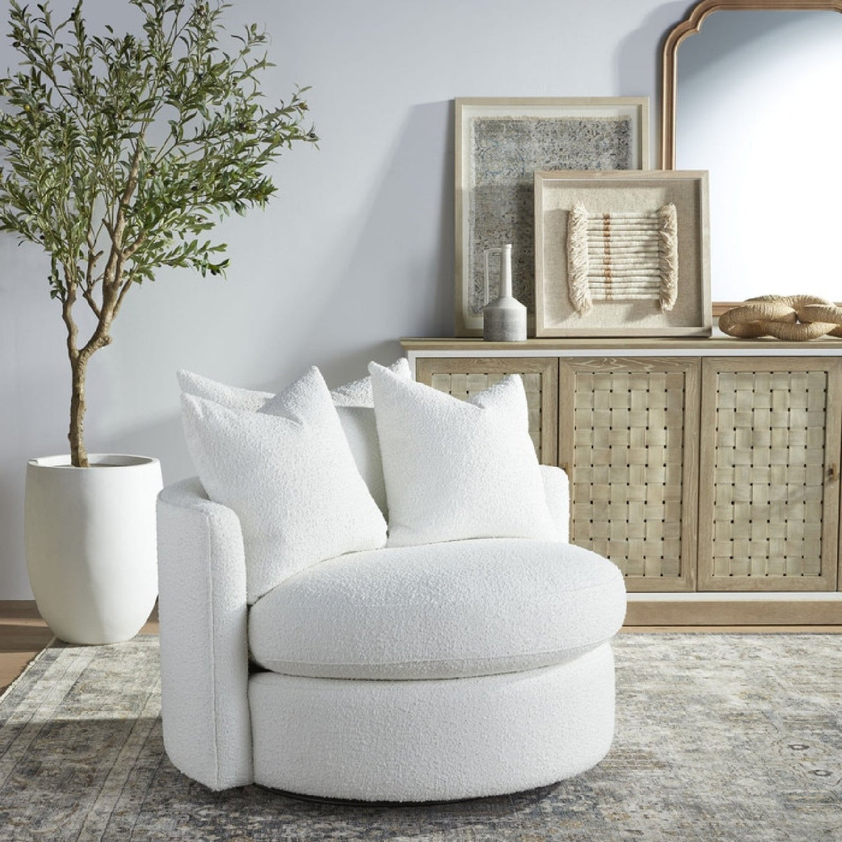 Round Petite Swivel Sofa | Living Essentials Lourne – angled view