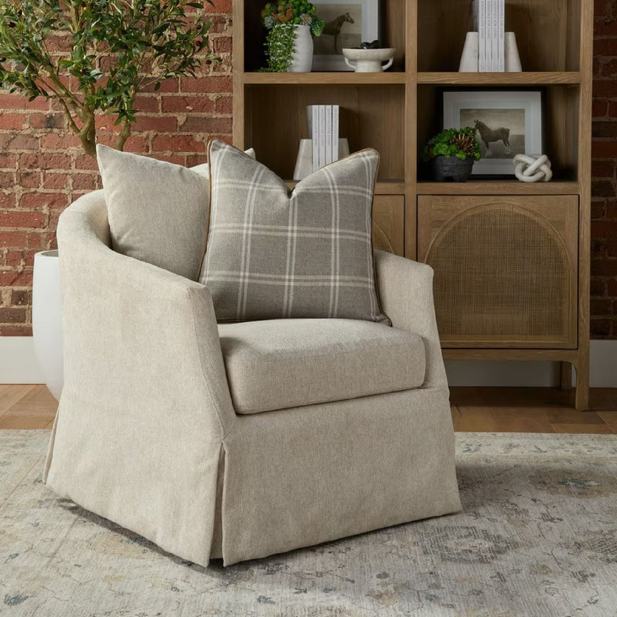 Skirted Swivel Club Chair | Living Essentials Faye – angled view