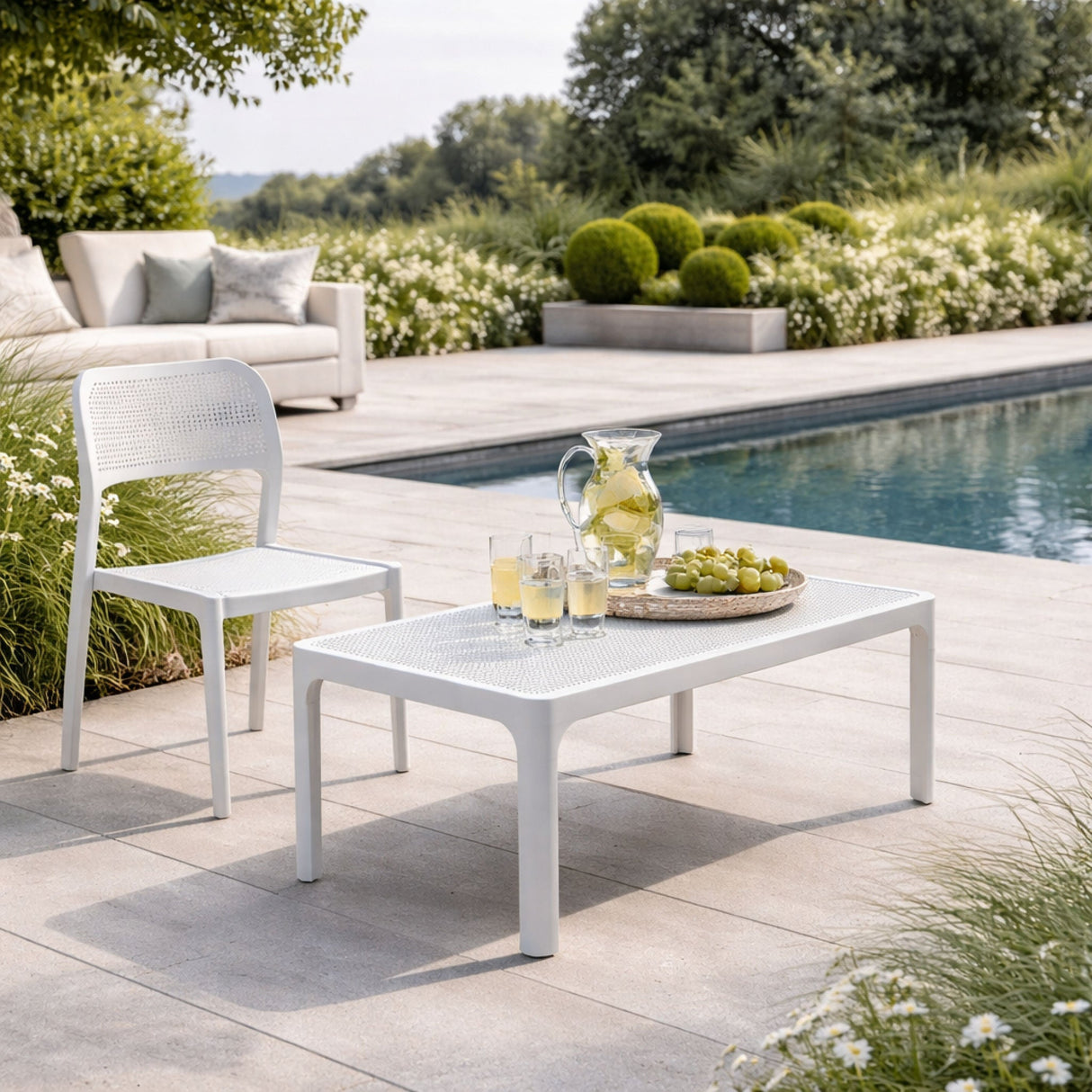Outdoor Perforated Rectangular Coffee Table – Net – outdoor angled view