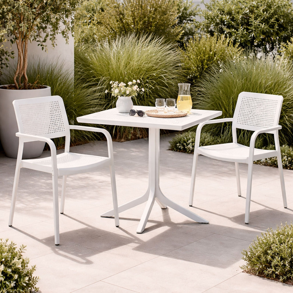 Perforated Square 4-Spoke Outdoor Dining Table – Clip – outdoor angled view