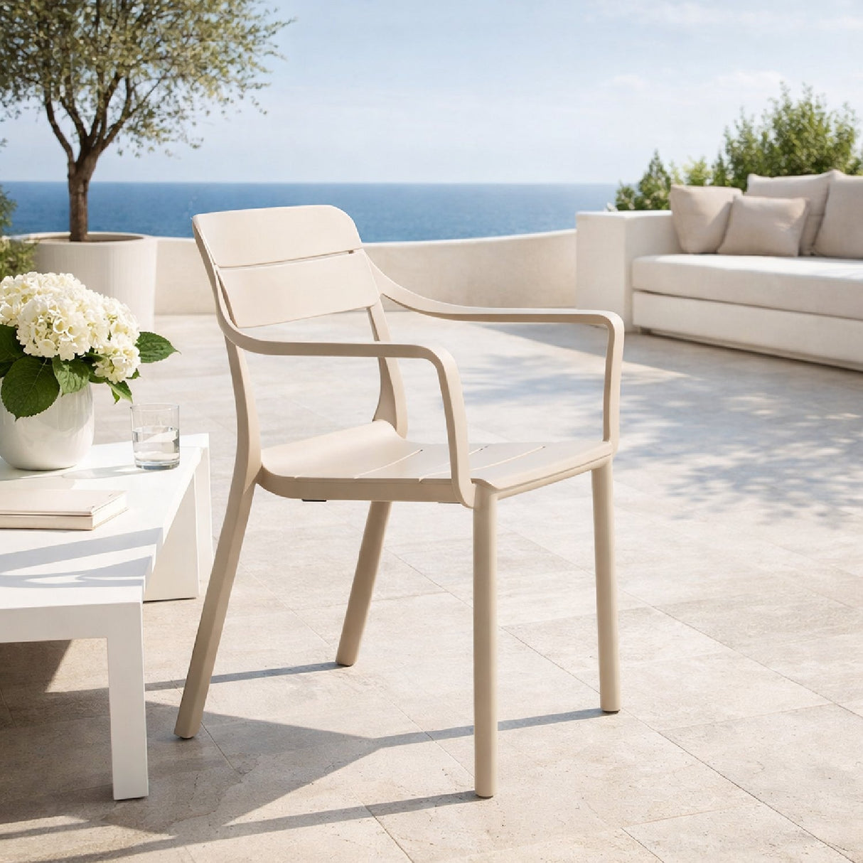 Fiberglass Outdoor Monobloc Dining Armchair – Cassia – outdoor angled view
