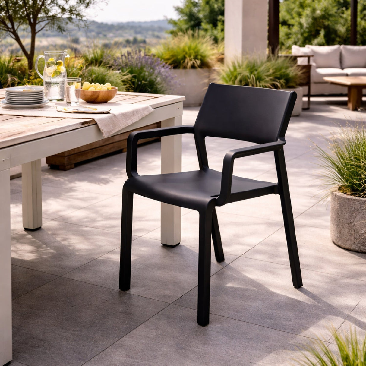 Open-back Outdoor Dining Armchair – Trill – outdoor rear view