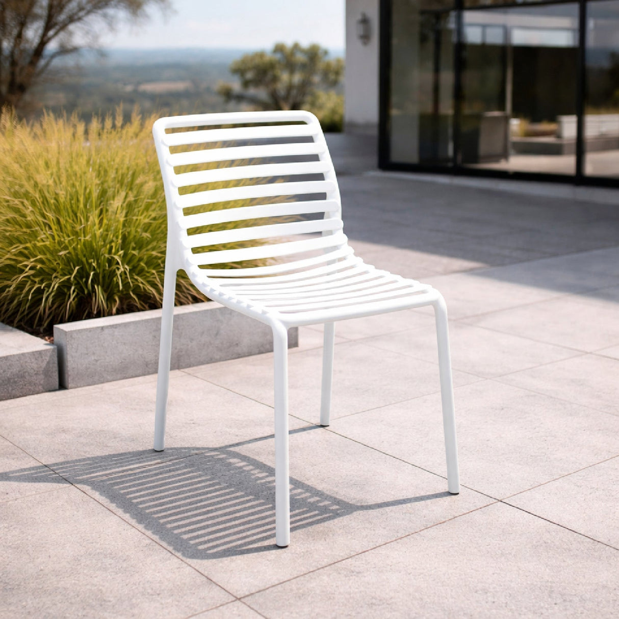 Slatted Outdoor Monobloc Dining Chair – Doga – outdoor angled view