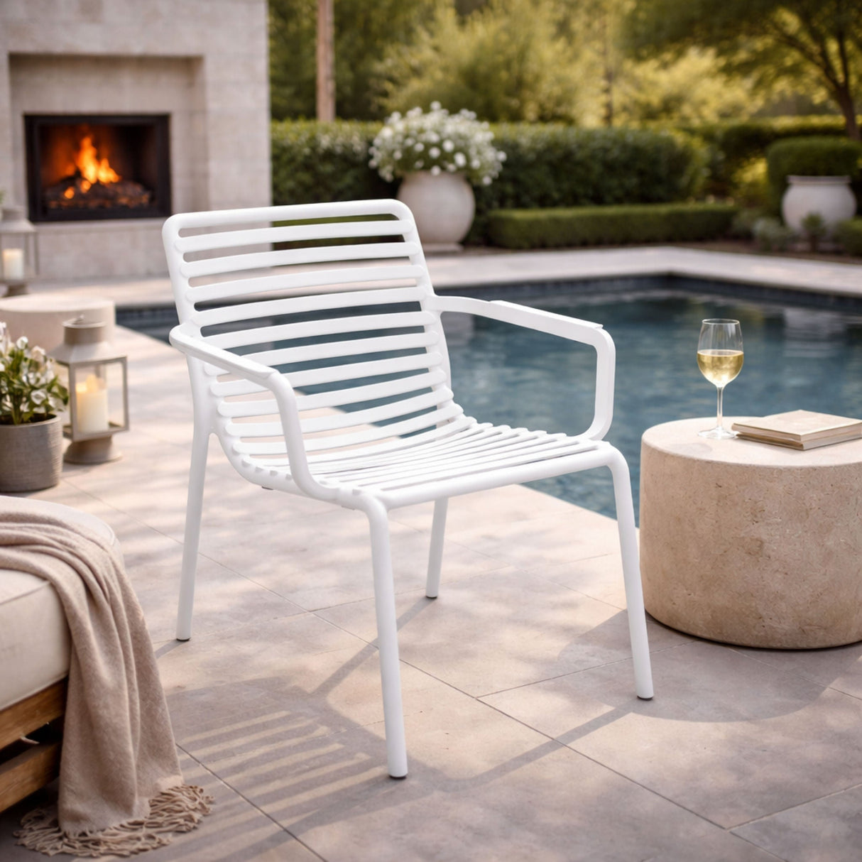 Slatted Stackable Outdoor Lounge Chair – Doga – outdoor angled view