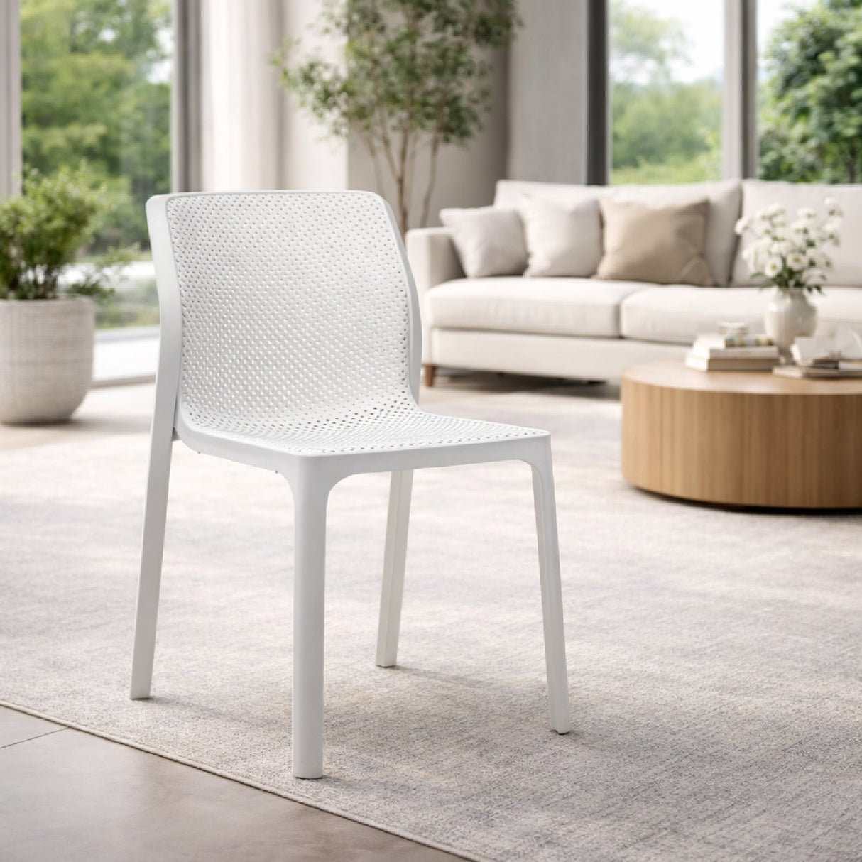 Perforated Monobloc Outdoor Dining Chair – Bit – outdoor angled view