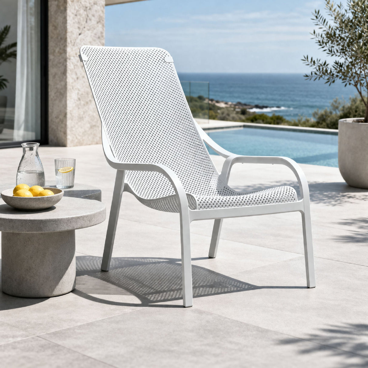Perforated Outdoor Lounge Chair – Net Lounge – outdoor angled view