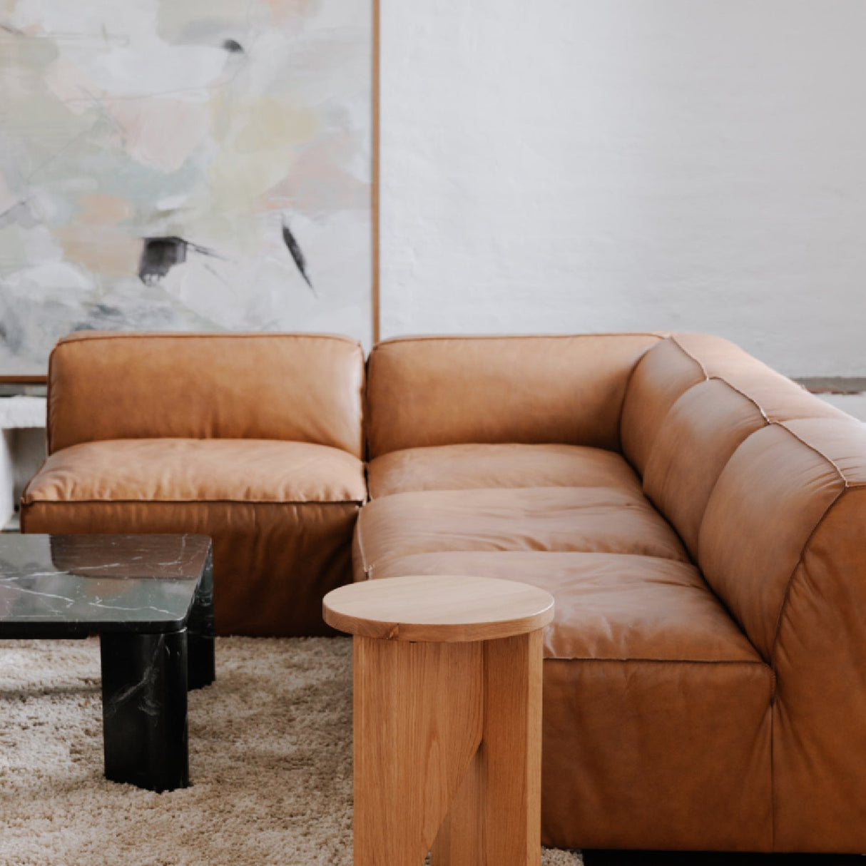 Tan Leather Corner Chair – Form – angled view