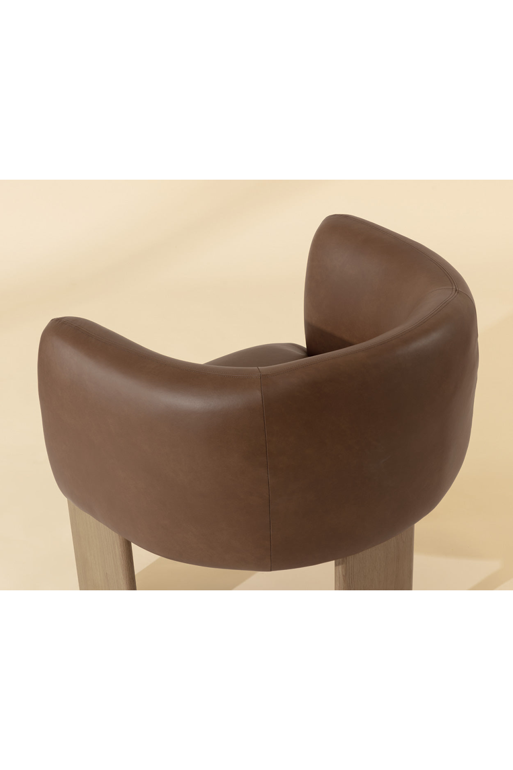 Brown Leather Curved Lounge Chair | Splendido Trine