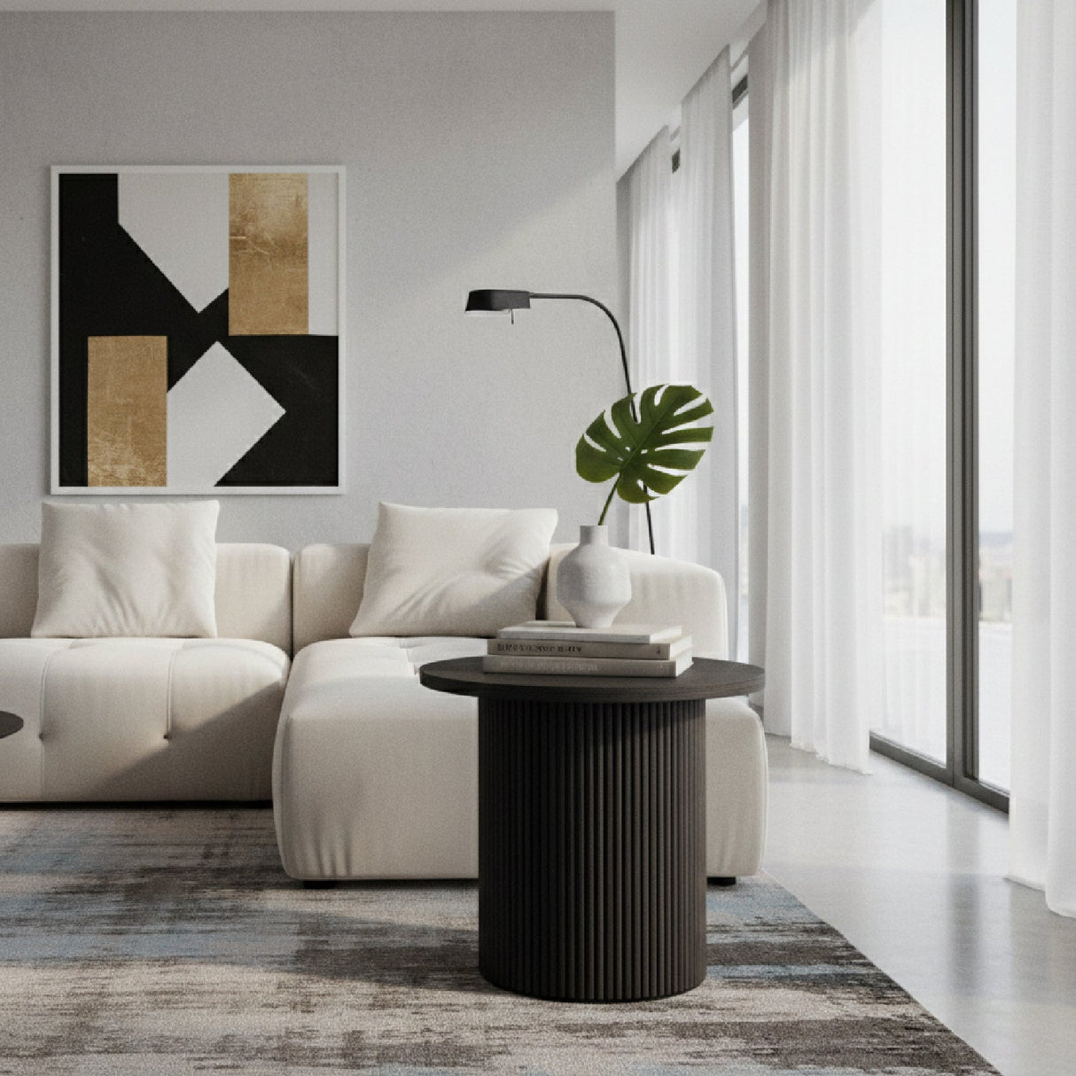 Black Ash Round End Table – Rawlins – angled view