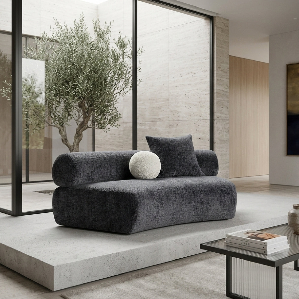 Gray Curved Armless Sofa – Simpson – angled view