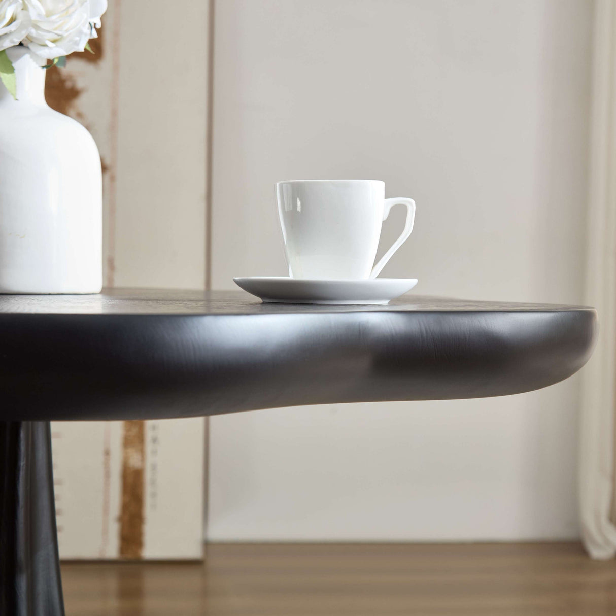 Black Sculptural Petal Dining Table | OROA