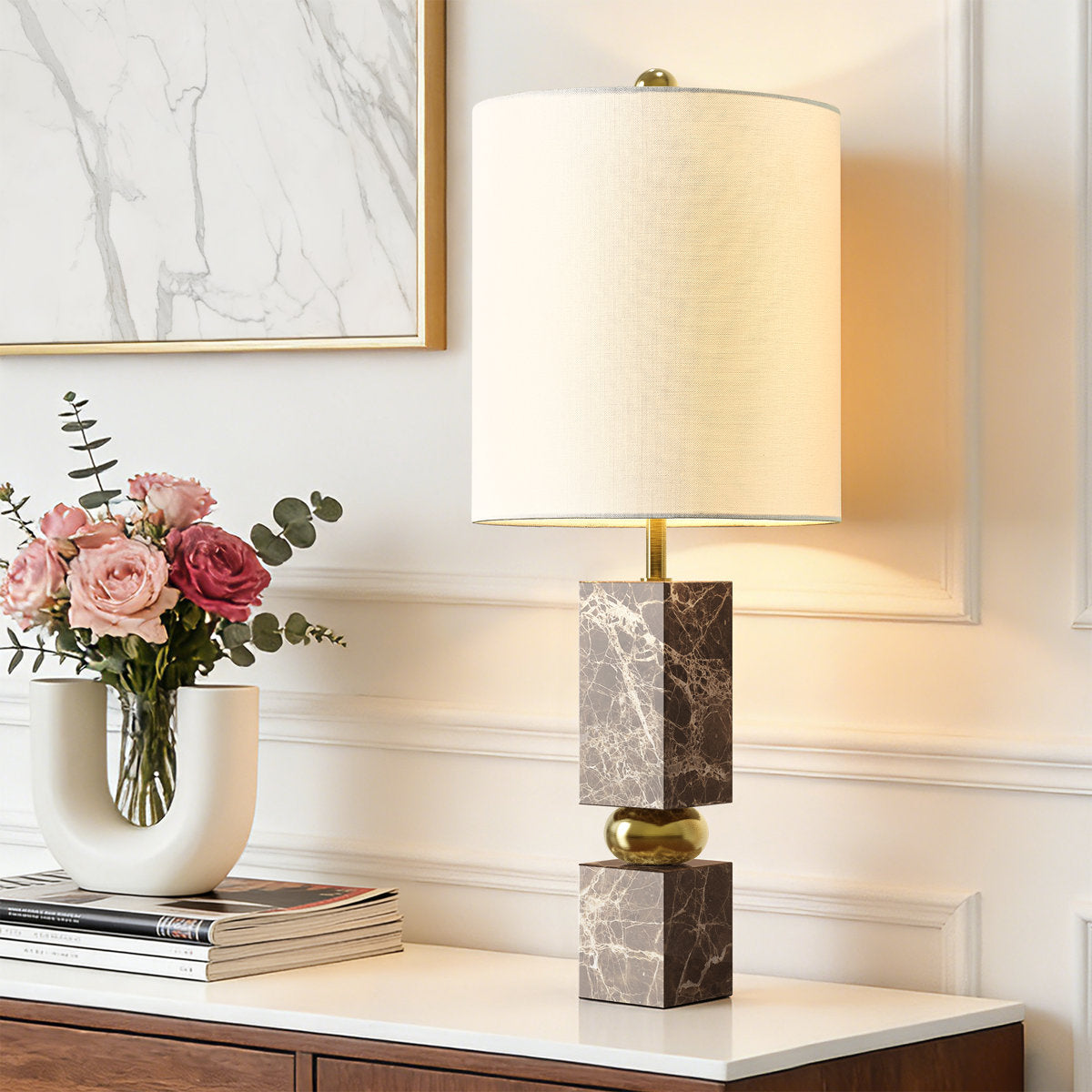 Brown Marble and Gold Metal Table Lamp — lit on a console