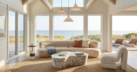   Curved sofa and marble coffee table in light-filled spring 2026 interior. | Oroa.com