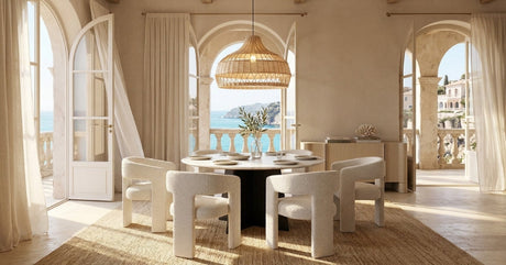   Bright coastal space with an OROA dining table, upholstered chairs, and arched windows. | Oroa.com