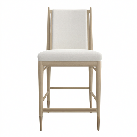 Caracole Unity ivory bouclé counter stool with an upholstered back and wood frame