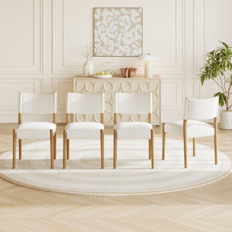 Cream Upholstered Natural Wood Dining Chairs — set arranged in a dining room