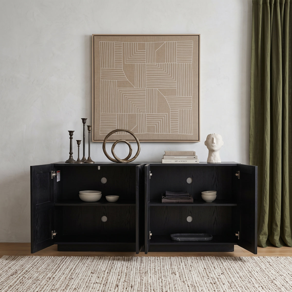 Black Geometric Four-Door Sideboard — open storage styled in a living room