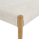 Cream Upholstered Natural Wood Dining Chairs — seat cushion and leg close-up