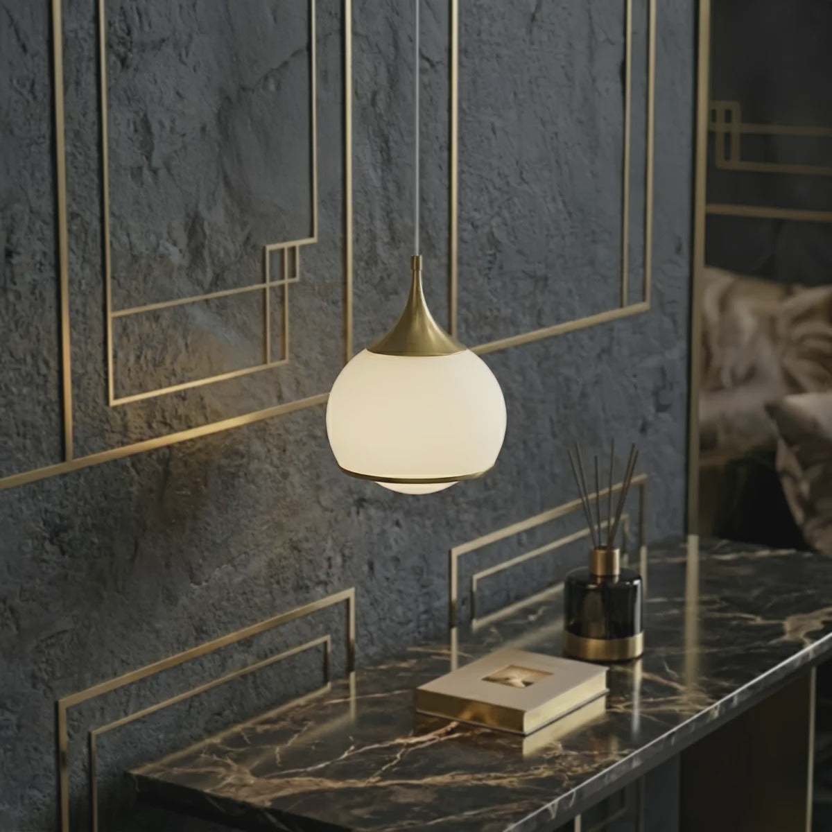 Gold Glass Integrated LED Pendant Light — above a bathroom vanity