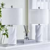 White Sculpted Ceramic Table Lamps — pair on a console with lights off