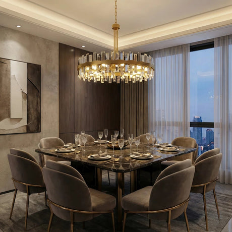 Gold Eight-Light Crystal Drum Chandelier — above a dining table