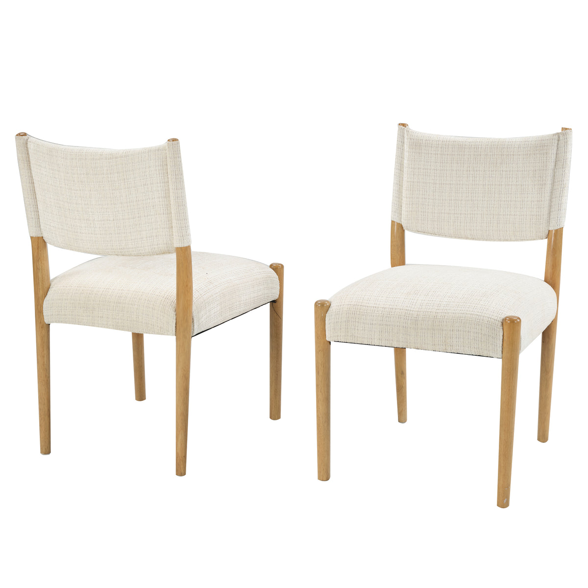 Cream Upholstered Natural Wood Dining Chairs — two chairs in three-quarter view