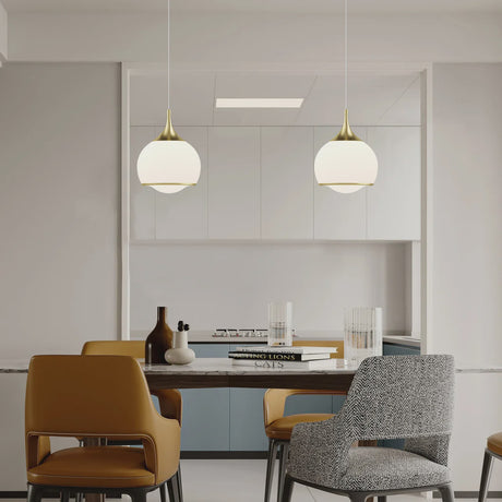 Gold Glass Integrated LED Pendant Light — pair above a dining table