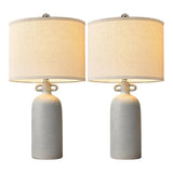 Gray Textured Ceramic Dimmable Table Lamps — lit pair on a white background