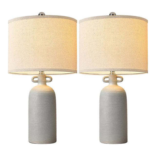 Gray Textured Ceramic Dimmable Table Lamps — lit pair on a white background
