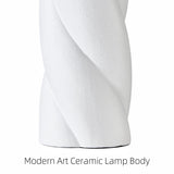 White Sculpted Ceramic Table Lamps — sculpted ceramic base close-up