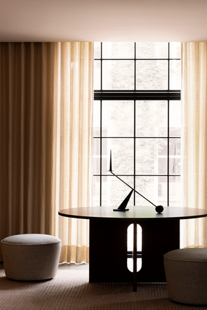 Intersecting-Base Round Dining Table | Audo Copenhagen Androgyne | Oroa.com