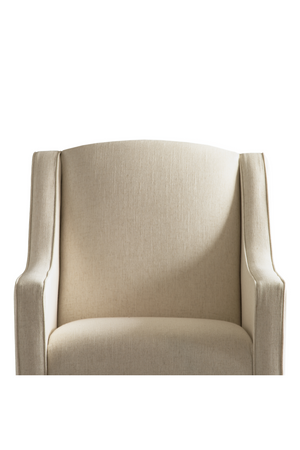 Cream Upholstered Curved Armchair | Andrew Martin Finbar | Oroa.com