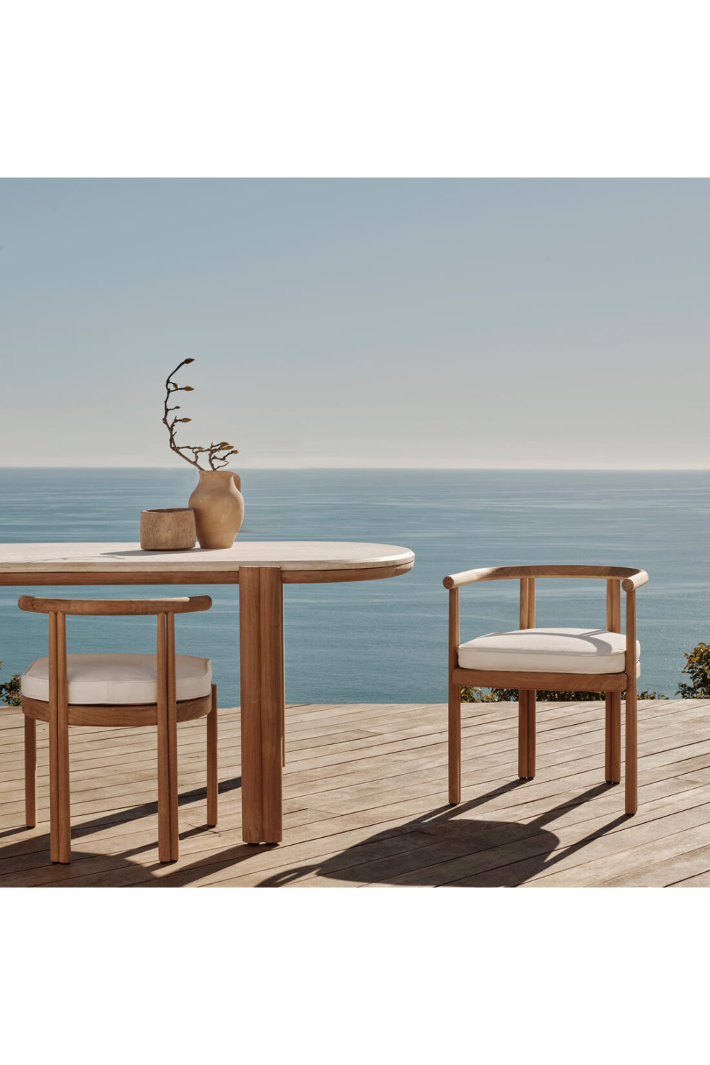 Curved Teak Outdoor Dining Armchair | Andrew Martin Cove | Oroa.com