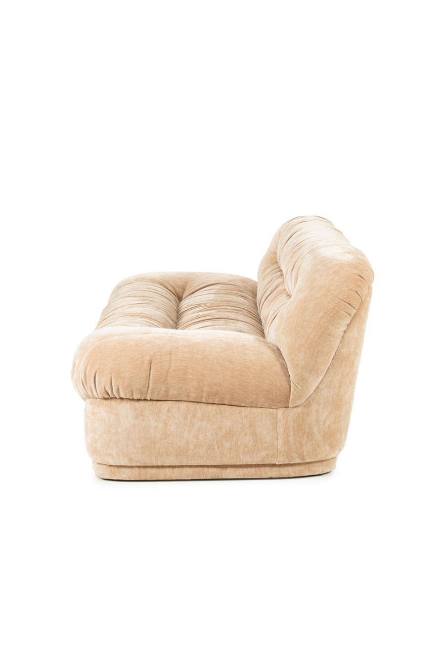Side-angle view of beige wrinkled sofa