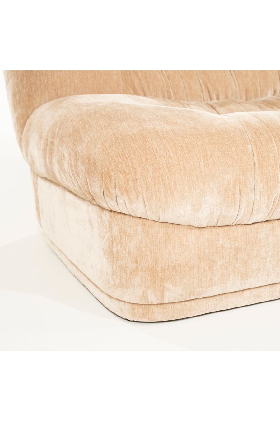 Close-up edge of sofa seating with base