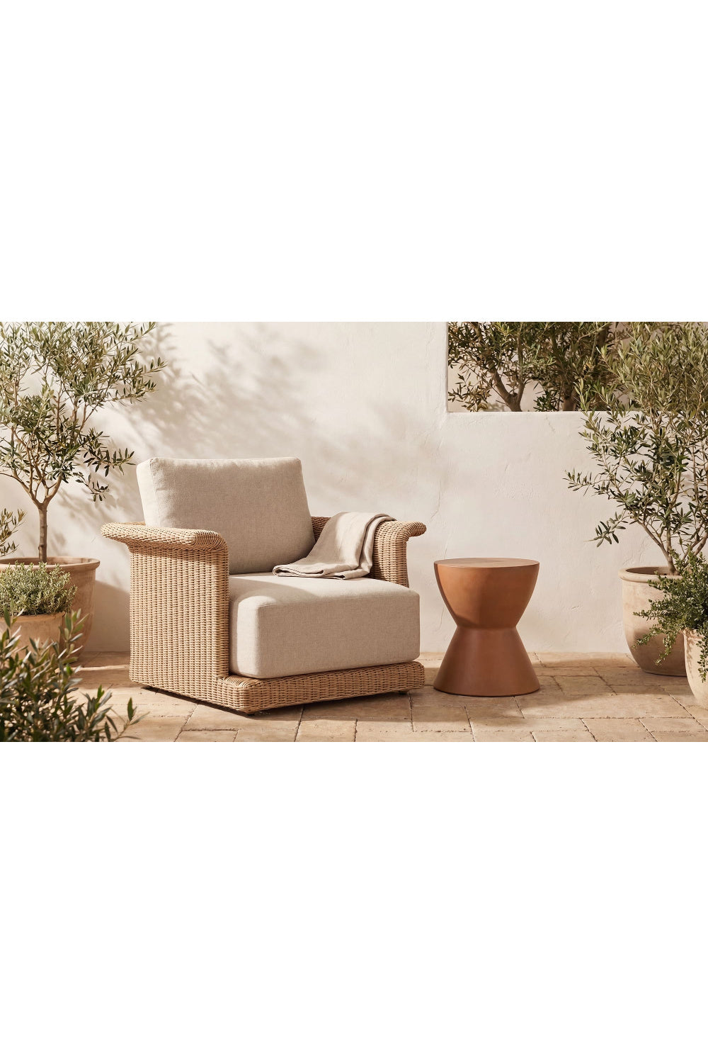 Curved Arm Wicker Outdoor Chair | Novi Living Meredith | Oroa.com