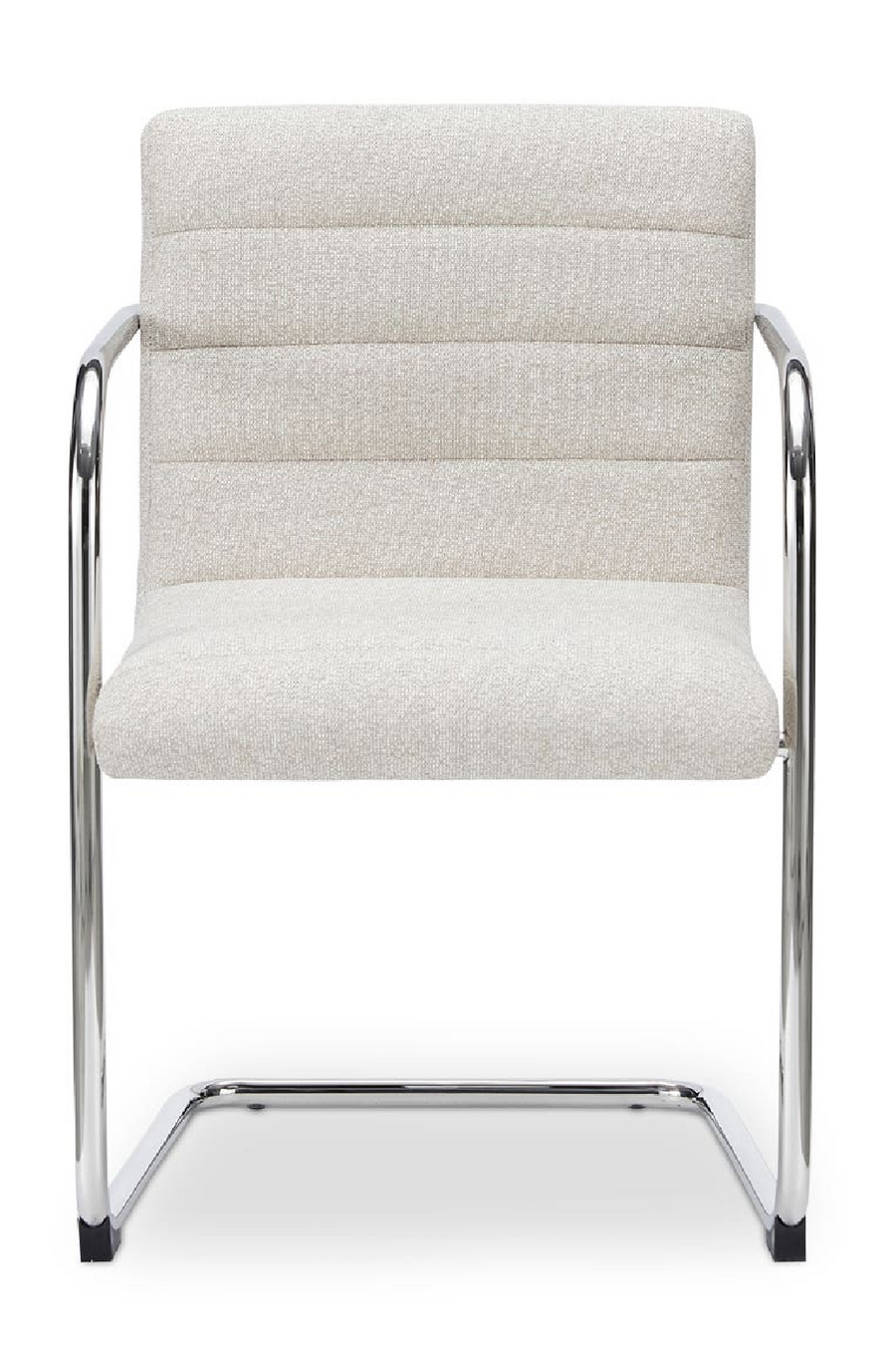 Front view of beige upholstered cantilever chair with chrome frame