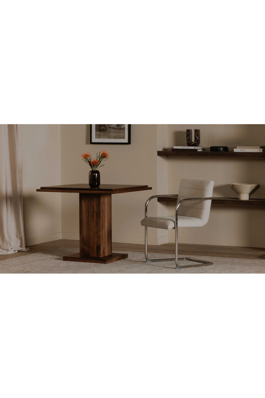 Cantilever chair placed at a wooden dining table in a room