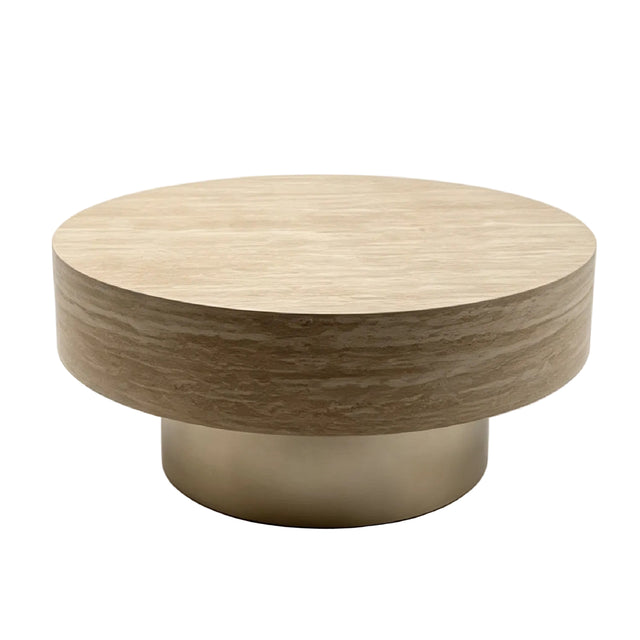 A modern round coffee table with a light beige wood-grain top and a brushed gold metal pedestal base.