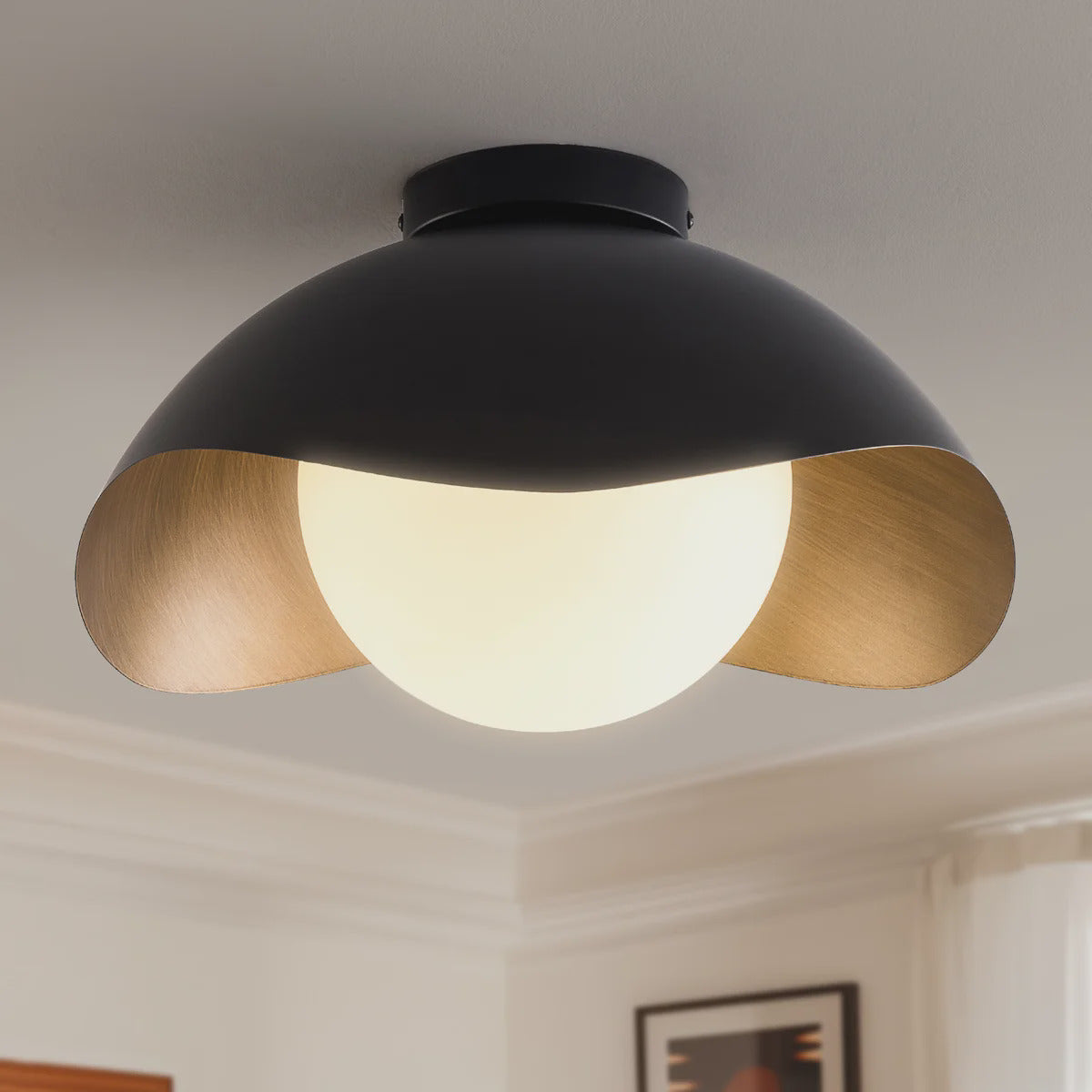 Matte Black and Gold Opal Glass Ceiling Lamp — lit globe and shade close-up