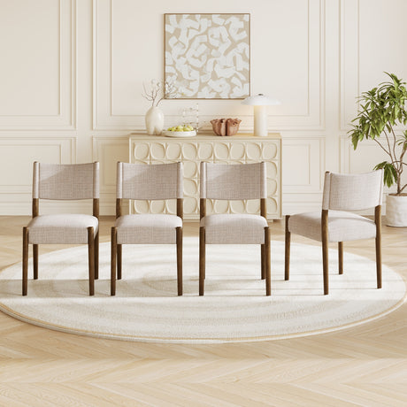Upholstered dining chair with walnut-finish legs — set arranged in a dining room