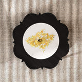 Black Petal Coffee Table with Rattan Shelf
