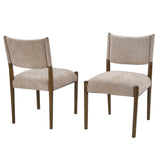 Upholstered dining chair with walnut-finish legs — two chairs in three-quarter view