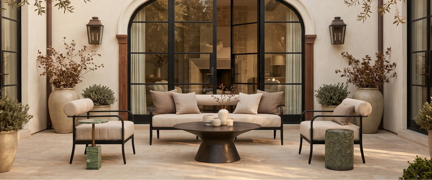 Fall outdoor living space featuring OROA furniture with autumn-inspired tones, layered textiles, and natural surroundings.