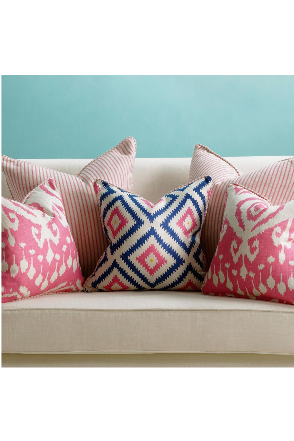 Teal and 2025 pink cushions